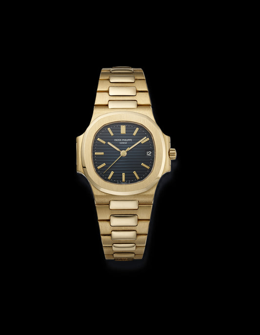 Patek Philippe Nautilus - Gold + Black Dial 42mm
