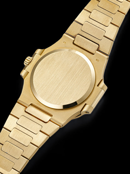 Patek Philippe Nautilus - Gold + Black Dial 42mm