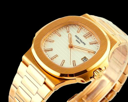 Patek Philippe Nautilus - Yelllow Gold + White Dial 42mm