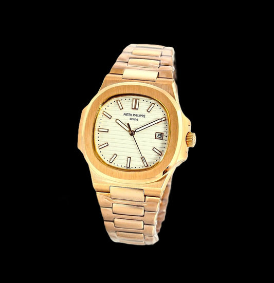 Patek Philippe Nautilus - Yelllow Gold + White Dial 42mm
